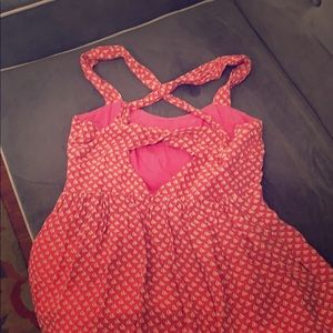 A precious pink sailboat covered play dress.